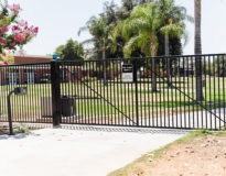 CA School Riverside 2 swinging wrought iron automatic gate