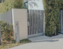 contemporary pedestrian gate vertical capped pickets
