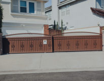 dual steel electric slide gates decorative scroll privacy backing