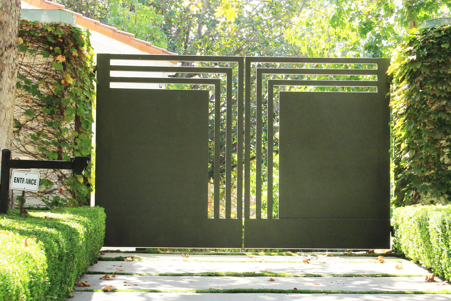 custom geometric steel bifold electric gate Los Angeles