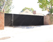 custom built steel lattice sliding electric gate and pedestrian gate Los Angeles